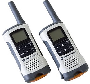 Two regular 'walkie talkie' type handheld UHF radios.